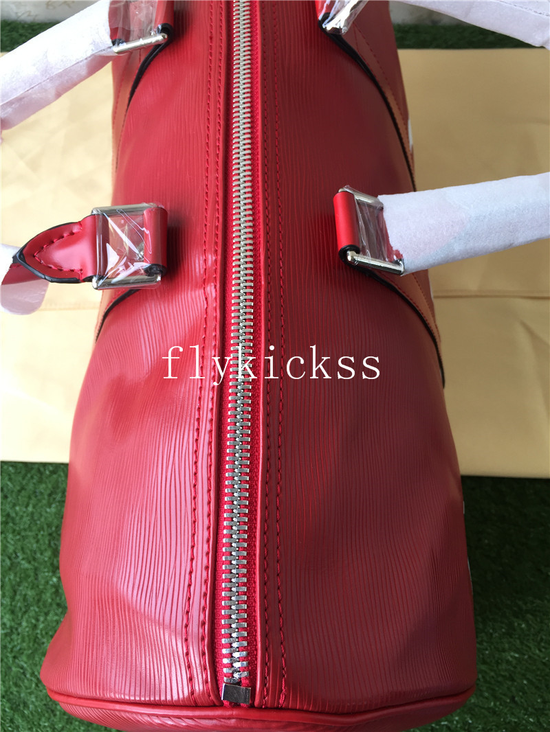 Supreme LVS Traveling Red Duffle Bag